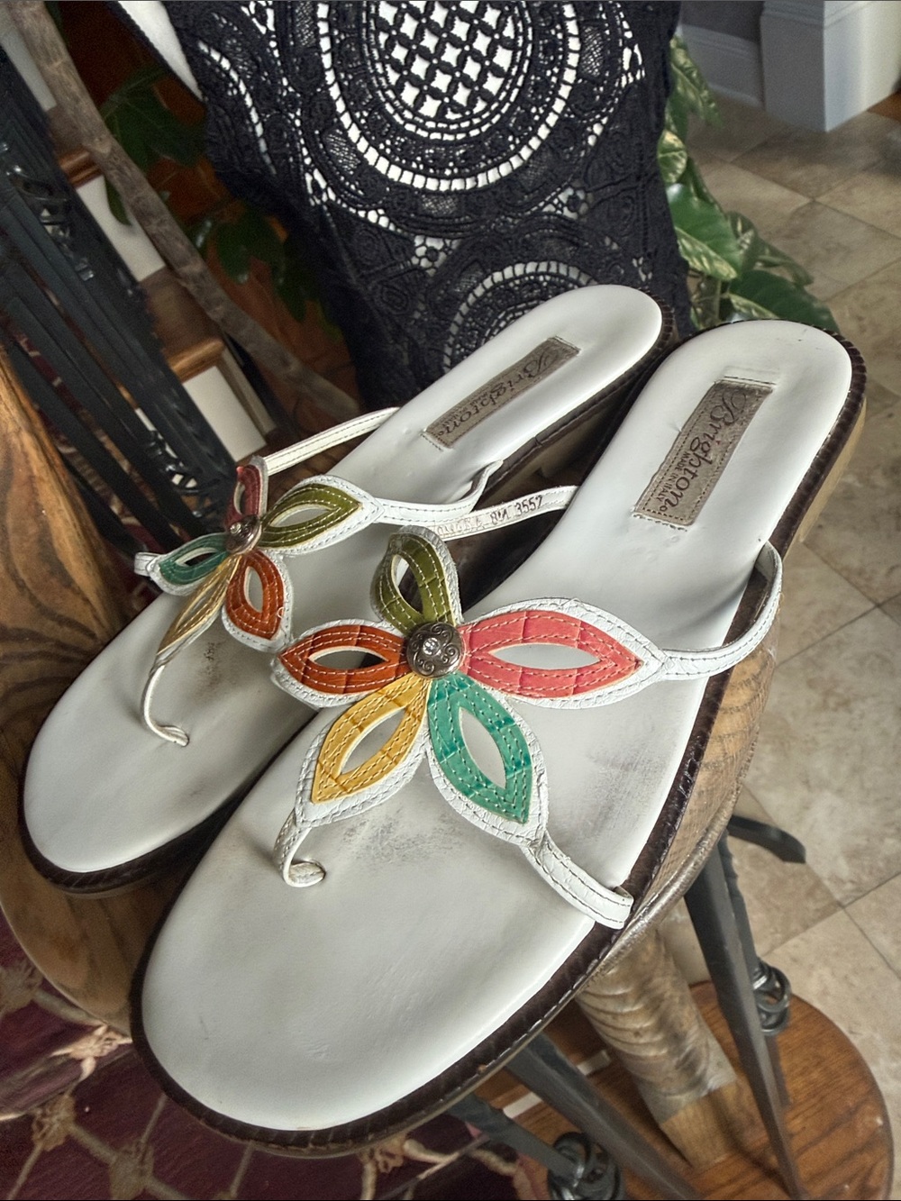Brighton white leather Omega sandals featuring a charming multicolored 8